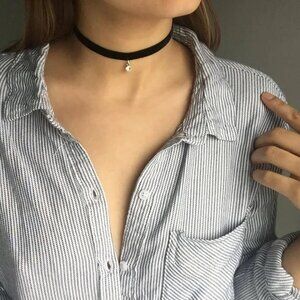 Black velvet choker with diamond charm